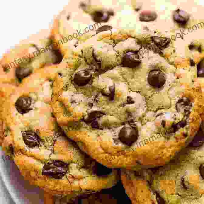 A Close Up Of Freshly Baked Chocolate Chip Cookies, Golden Brown And Studded With Generous Chunks Of Dark Chocolate. Four Famous Cookie Recipes: Independent Author
