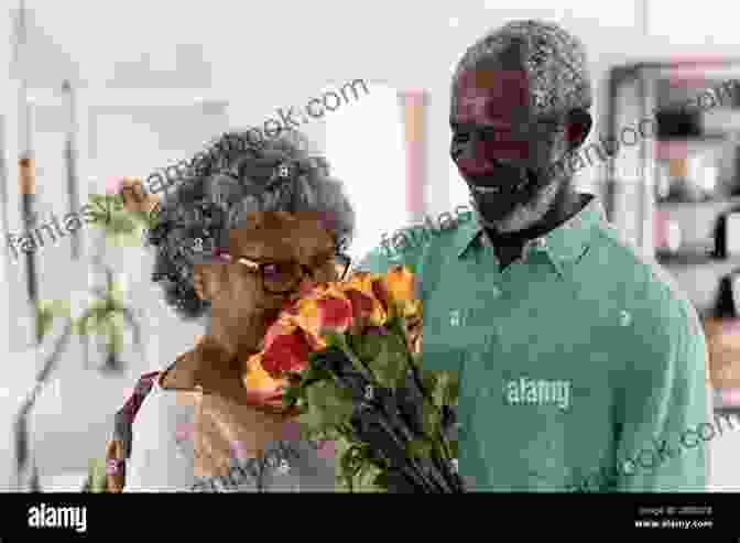 A Man Receiving Flowers From His Wife, Illustrating The Significance Of Understanding A Partner's Love Language. How To Be Your Husband S Lover: Practical Ways To Keep The Sparkle In Your Marriage Lit And Make Your Husband Crazily In Love With You Easy Guide For Women