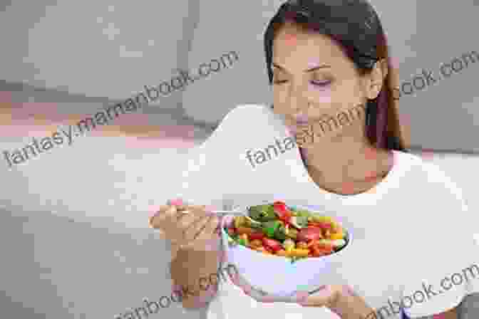 Image Of A Person Practicing Mindful Eating At A Table With A Plate Of Healthy Food. How To Eat (Mindfulness Essentials 2)